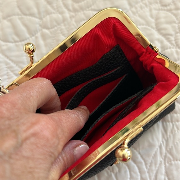 Dooney & Bourke Black Clutch with Gold Accents - Picture 5 of 10